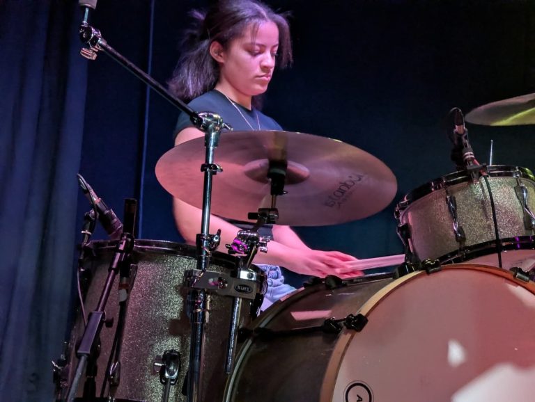 Angeline drumming with MTAE